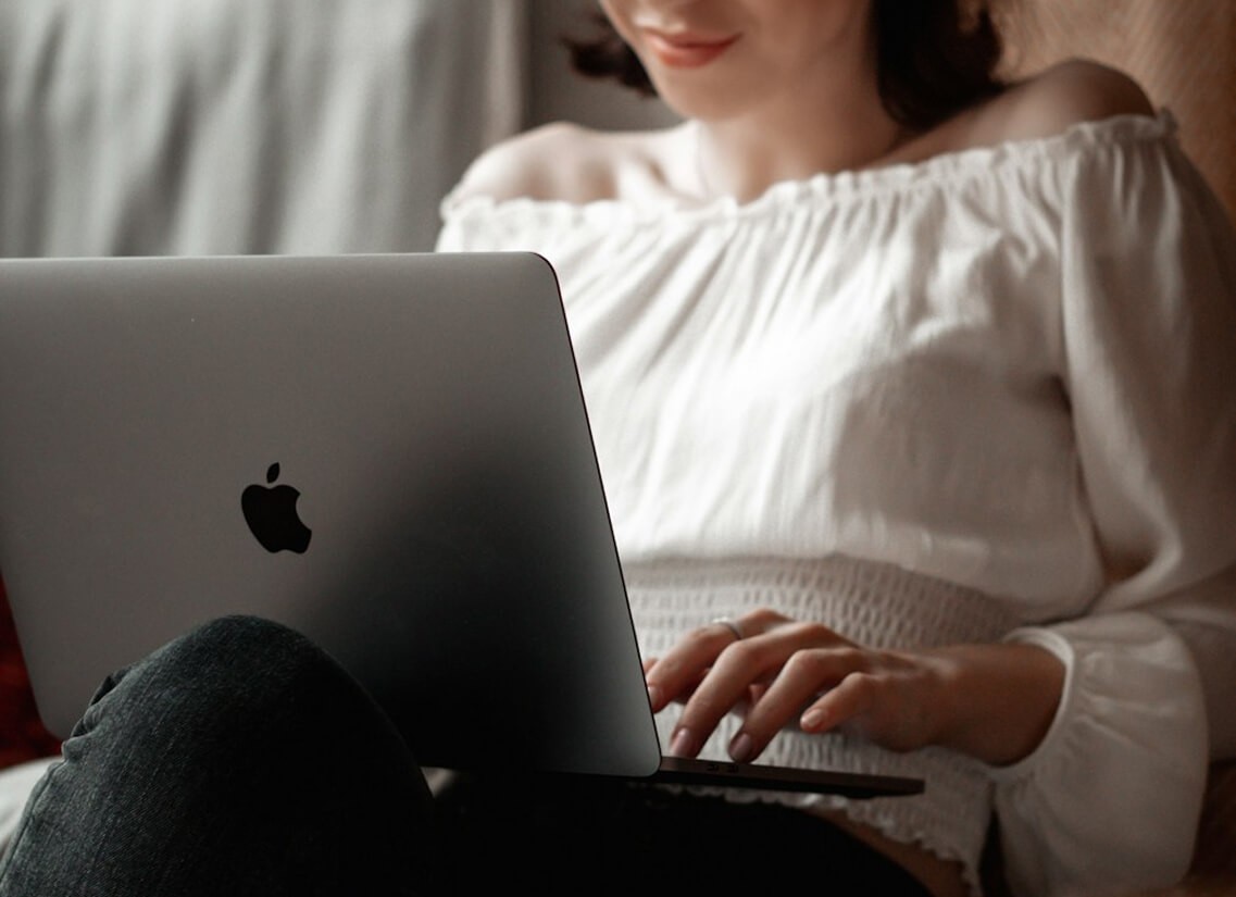 Woman using MacBook